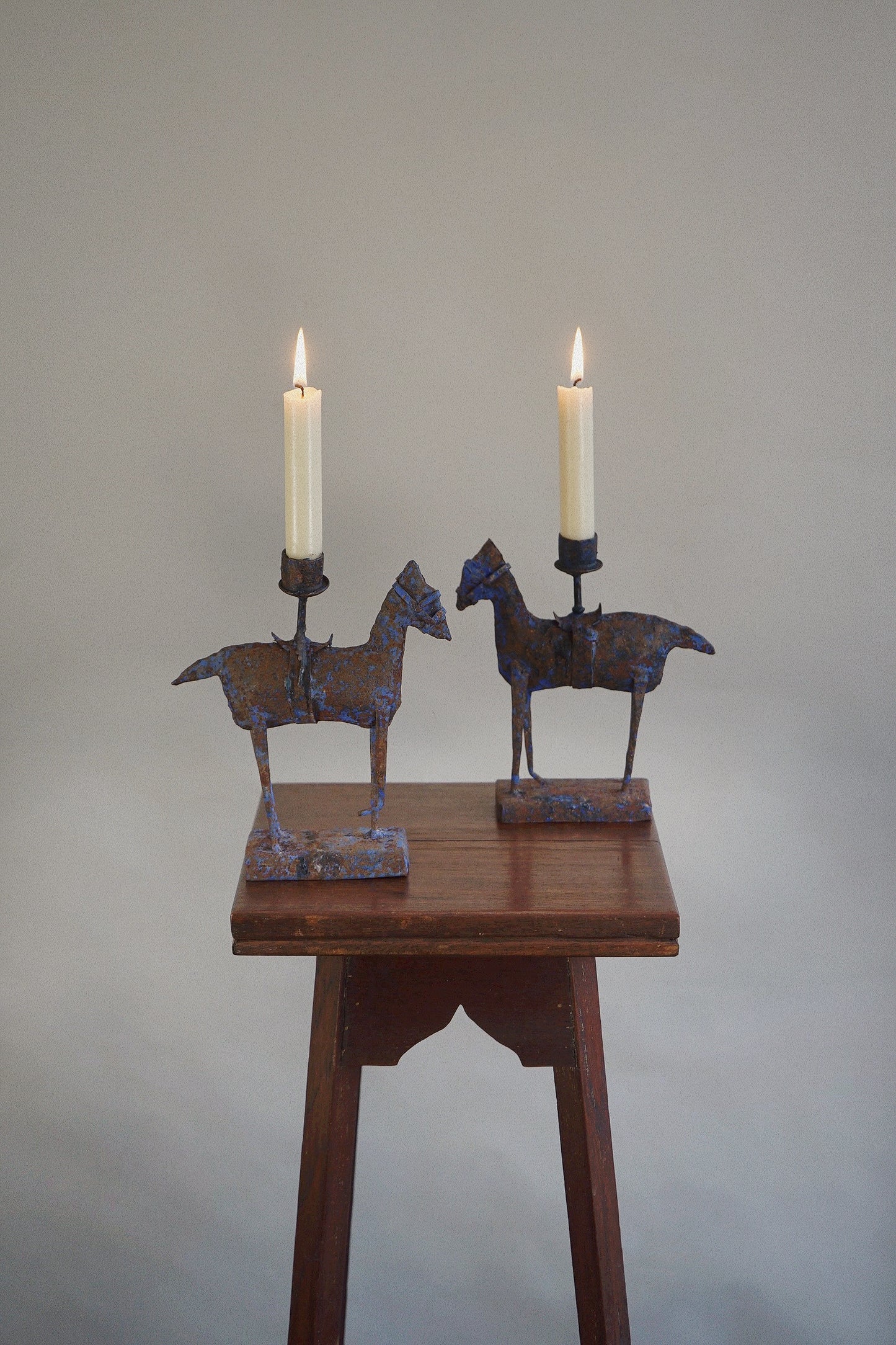 Pair of Folk Art Iron Horse Candlesticks Europe, 20th century