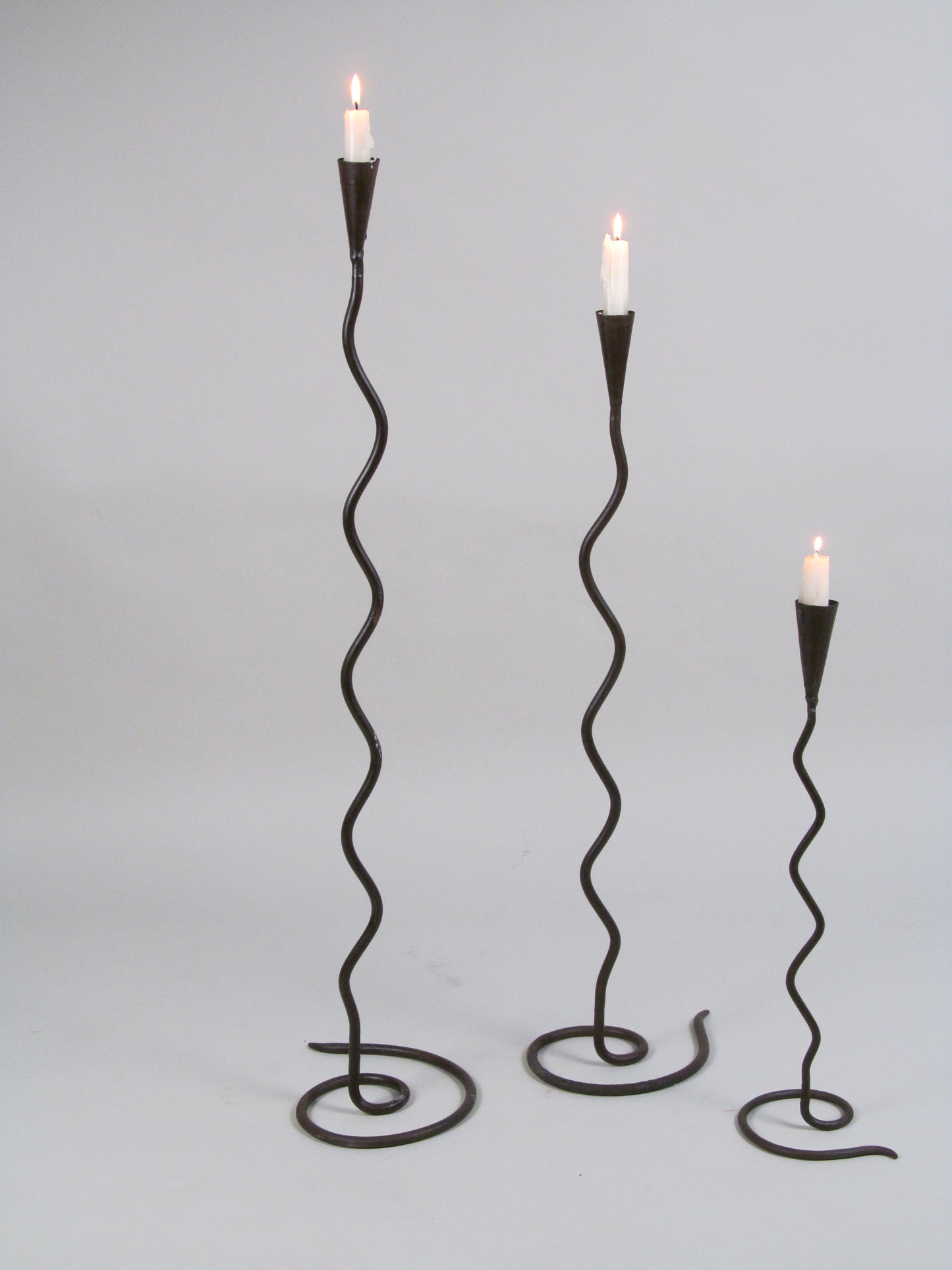 Set of Three Sculptural Iron Candleholders