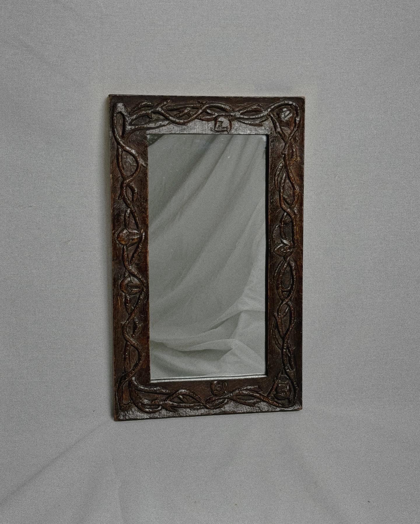 Hand carved wooden mirror