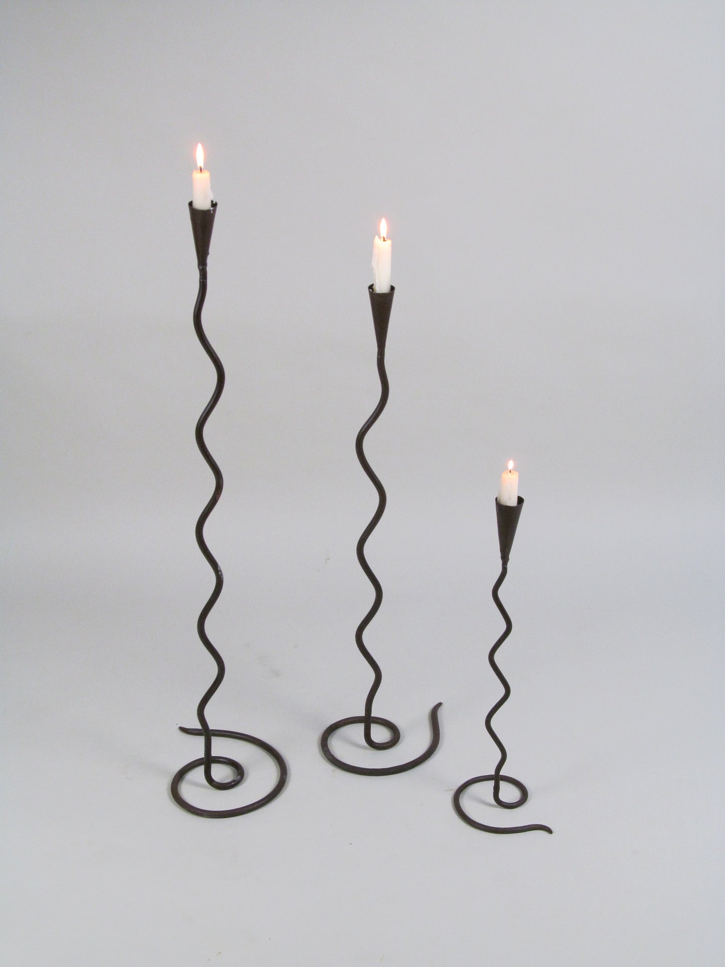 Set of Three Sculptural Iron Candleholders