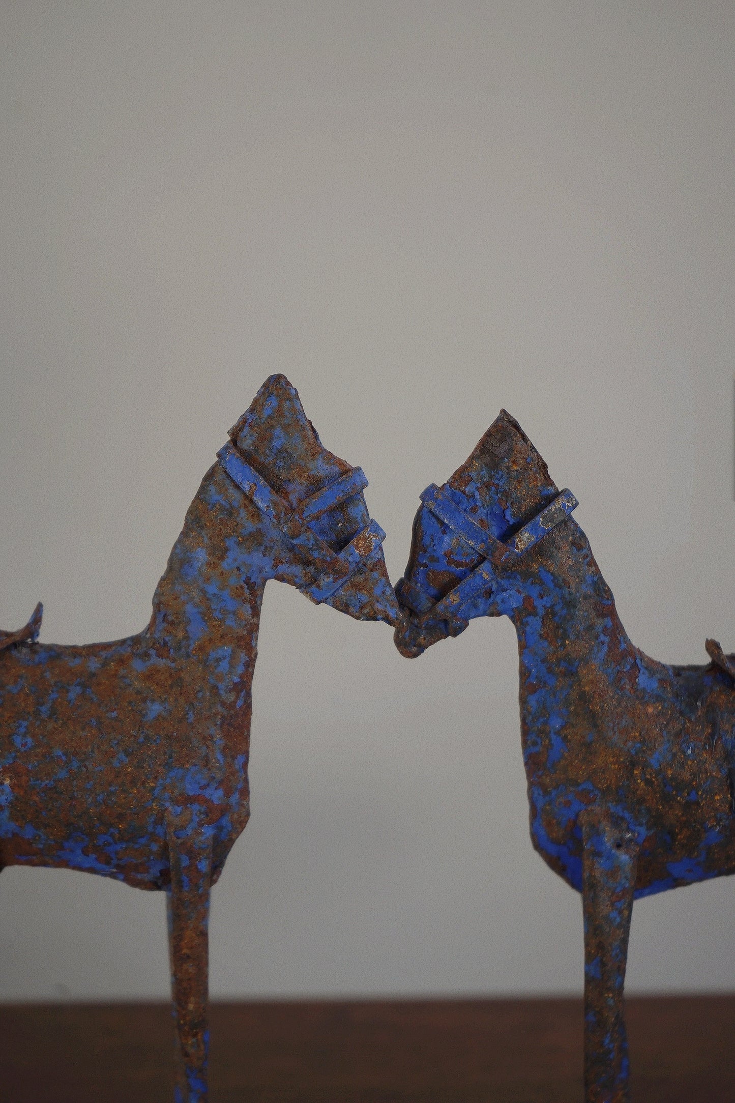 Pair of Folk Art Iron Horse Candlesticks Europe, 20th century