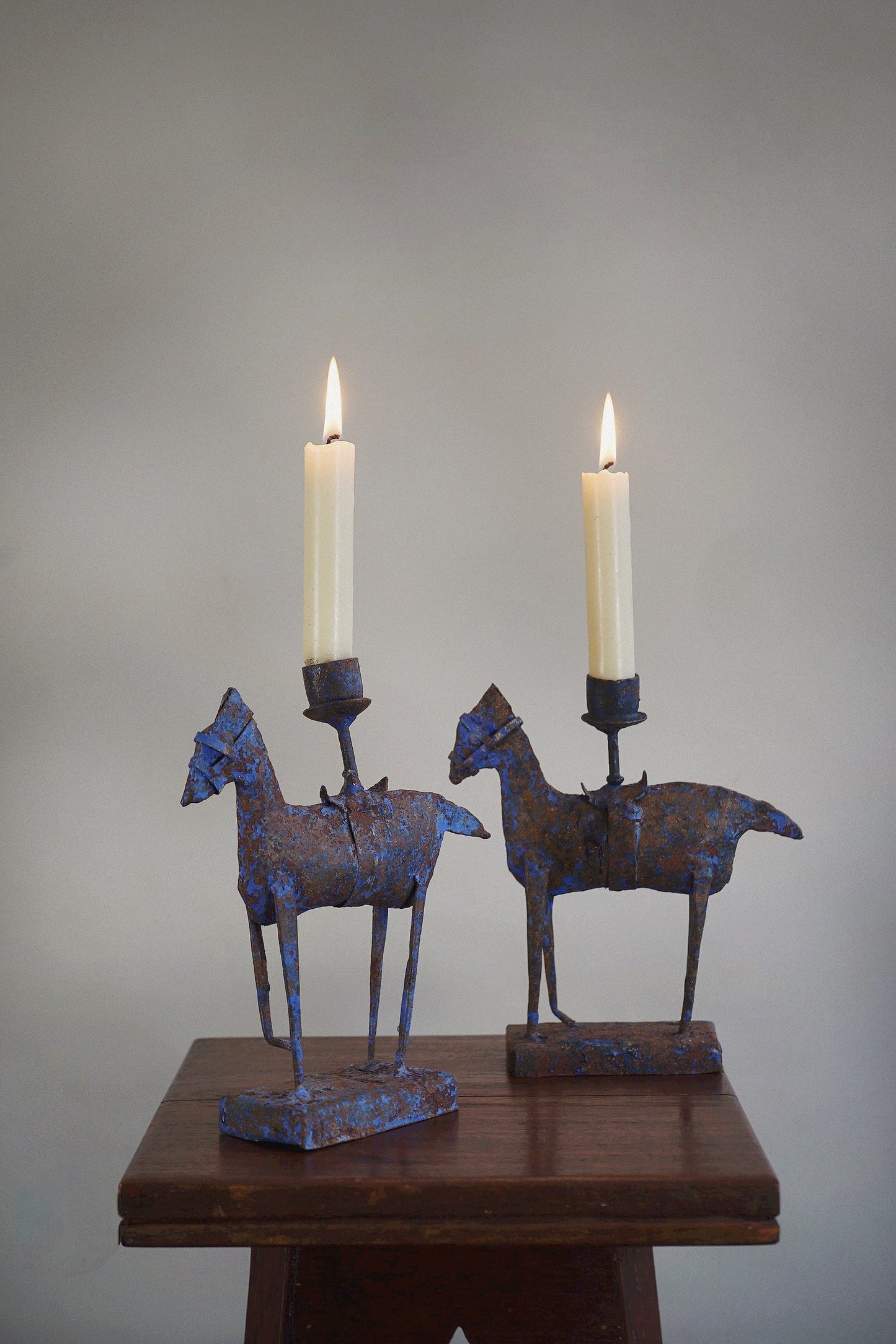 Pair of Folk Art Iron Horse Candlesticks Europe, 20th century