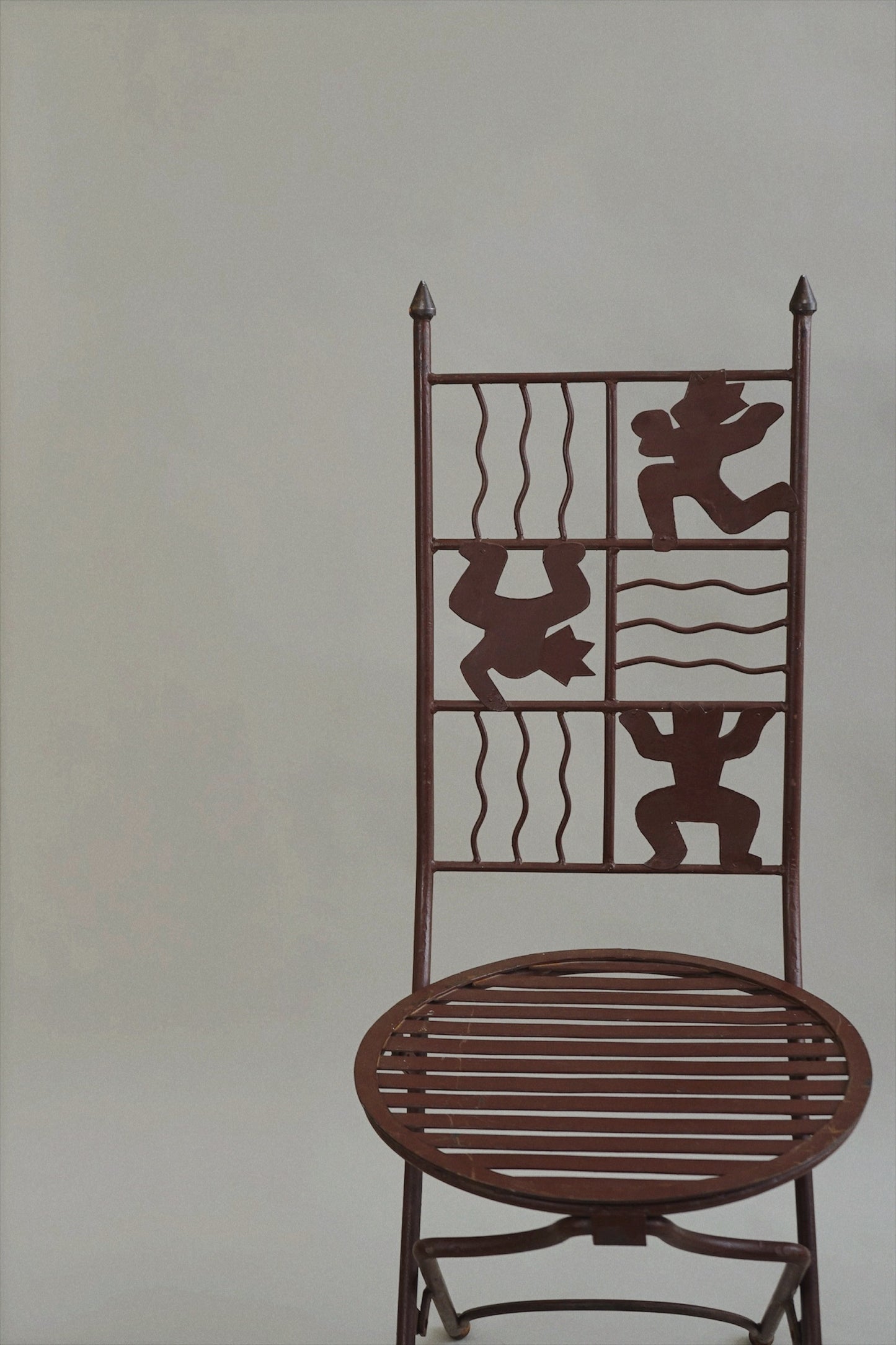 Iron Chair with Stylised Figures c.1980