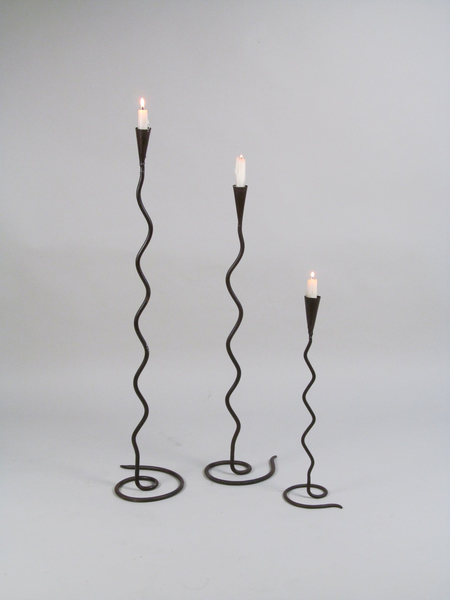 Set of Three Sculptural Iron Candleholders